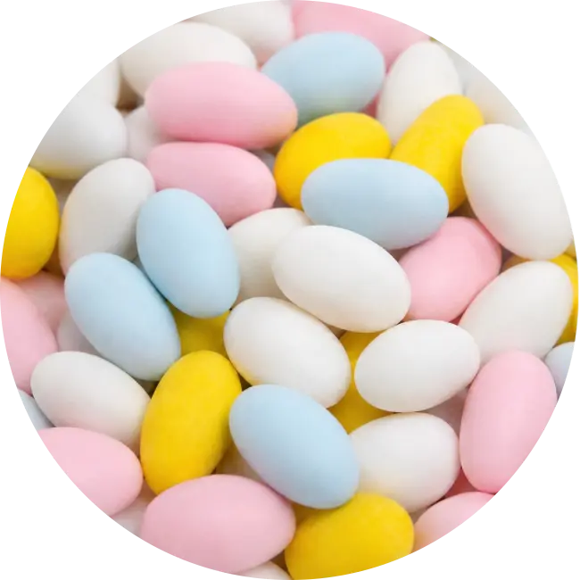 Pastel Sugared Almond Sweets in pink yellow and white