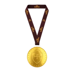 The Traitors Milk Chocolate Shield Medallion 26g with burgundy lanyard
